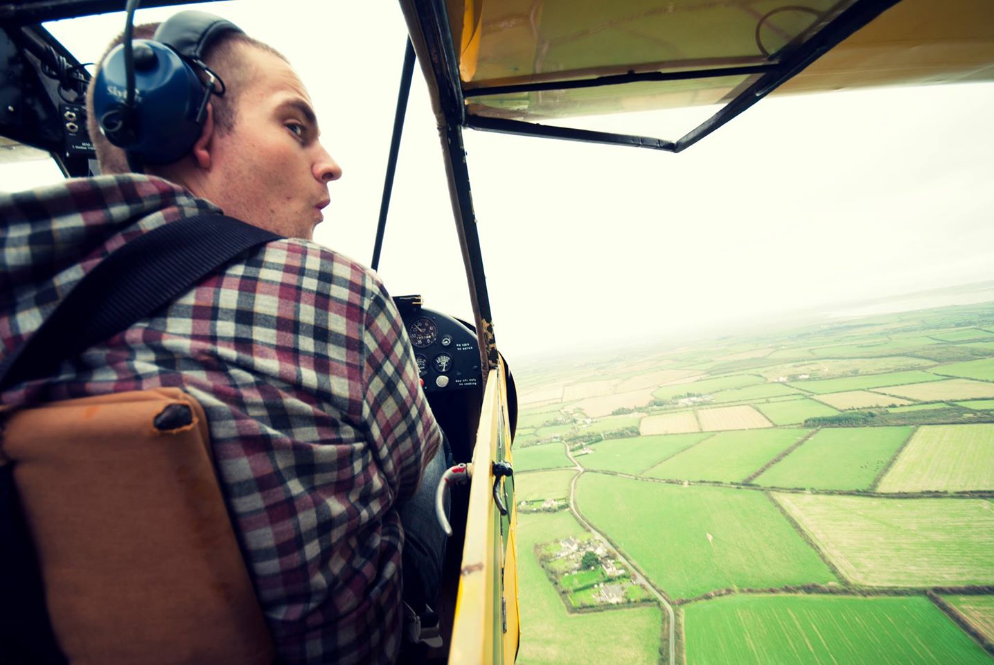 Piper Cub G-BJEI with Brian and Neil over Waterford. Photo by Neil Sheehan.
