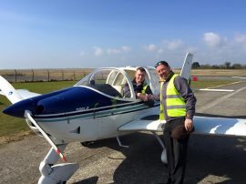 Brendan Geary congratulates Dean after his first solo flight