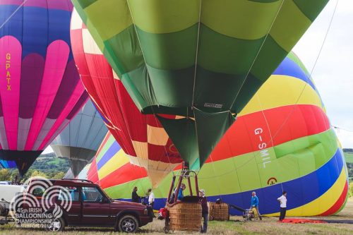 Balloons and baskets, nearly ready to fly! Photo by Peter Grogan of Emagine Media.