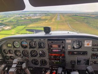 C172 EI-GWY on final approach to runway 21 at Waterford Airport
